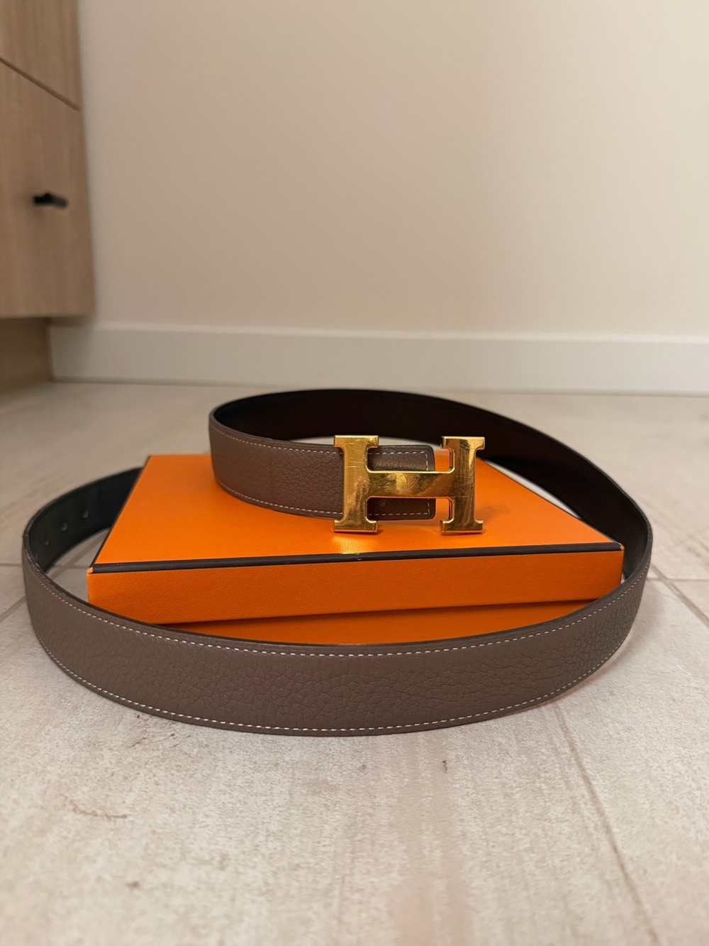 Hermès Constance H 32 mm reversible belt in Étoupe/Noir with gold hardware